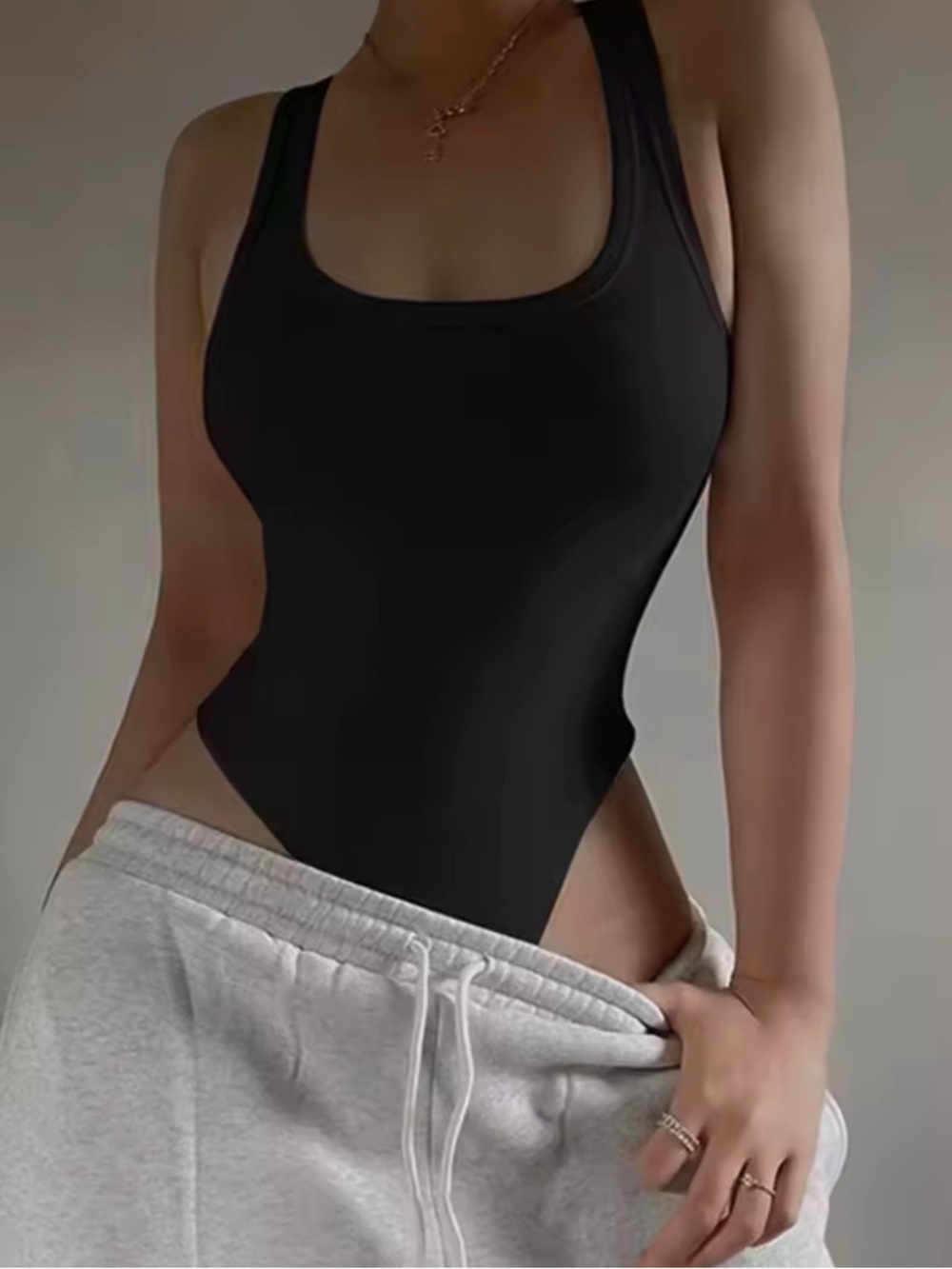 Black Ribbed Knit Bodysuit – Size Small